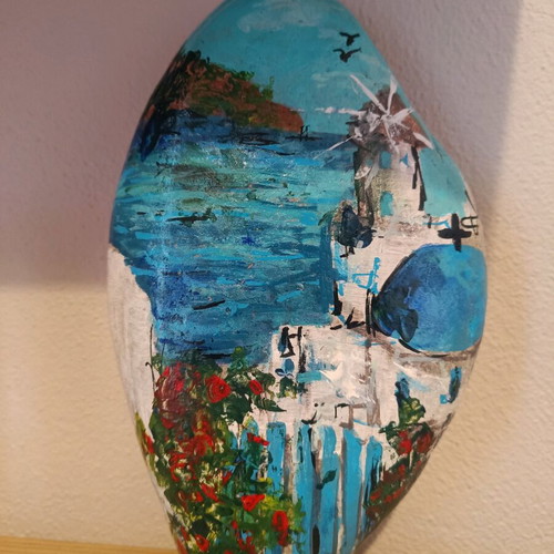 Painted stone new with acrylics and glossy varnish