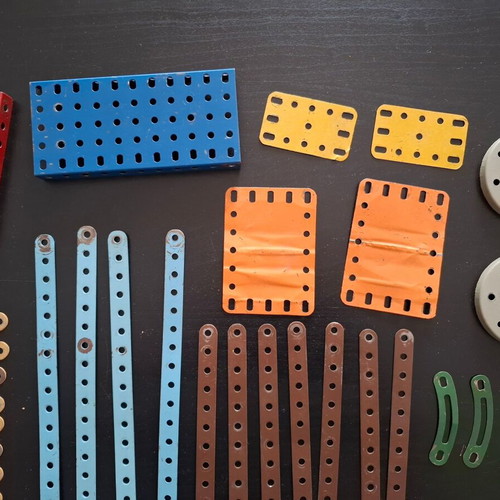 Metal construction toy used with wear
