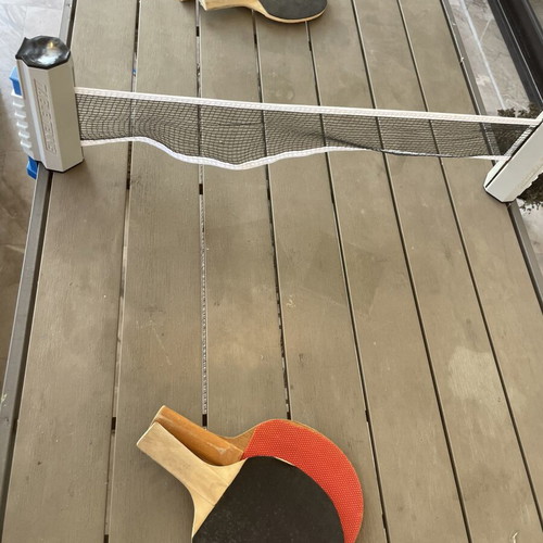 Ping pong net with rackets used, good condition