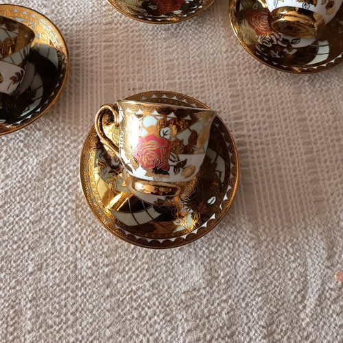 Coffee cups used, set of 4 with traditional designs
