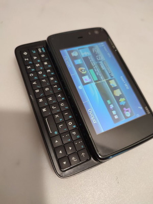 Nokia N-900 used, fully functional but does not charge, with charger