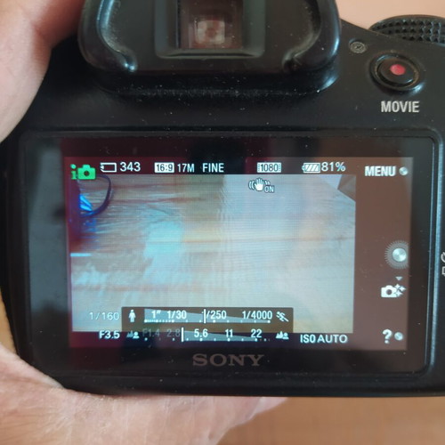 Sony A3000 camera used with E 18-55 3.5-5.6 OSS lens and accessories