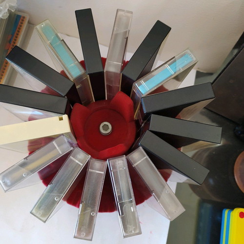 Aluminum rotating cassette holder like new with 16 slots