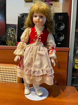 Vintage porcelain doll like new