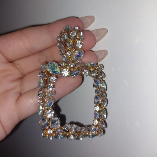 Long shiny earrings used