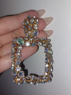 Long shiny earrings used