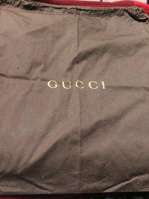 Gucci dust bag like new, brown cotton or flannel fabric