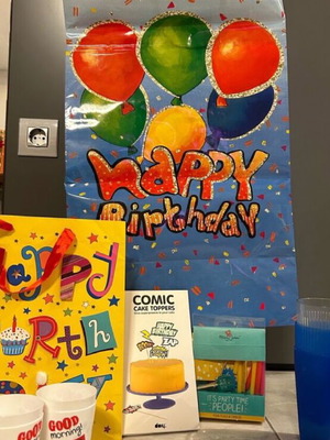 Party supplies new with cups, candles, flags and gift bags