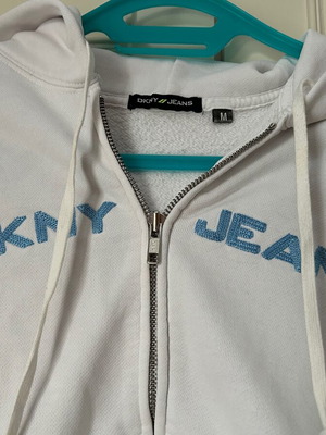 DKNY Women's white hoodie jacket, used in very good condition.
