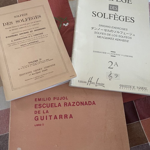 Guitar method and two solfège music books