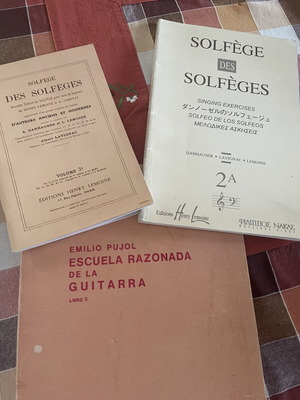 Guitar method and two solfège music books