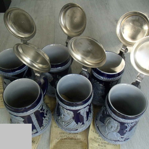 Porcelain steins M & R like new, set of 6 with metal lids