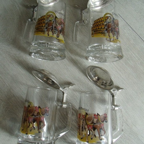 Set of 4 old glass beer steins with metal lids used