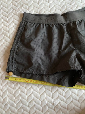 Adidas women's sports shorts used, size M, olive color