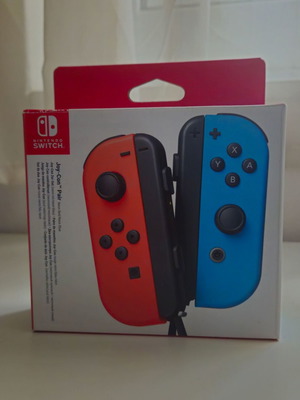 Nintendo Switch Joy-Con Neon Red/Neon Blue Box like new, collectible