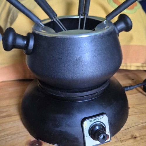 Fondue device like new for cheese and chocolate