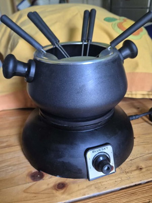 Fondue device like new for cheese and chocolate
