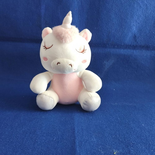 Small plush unicorn, pink and white