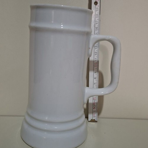 Large beer glass in traditional German design like new
