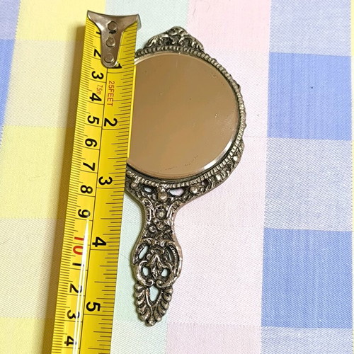 Vintage hand mirror used