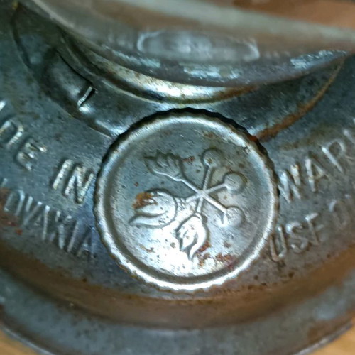 Vintage storm lantern used with cracked glass