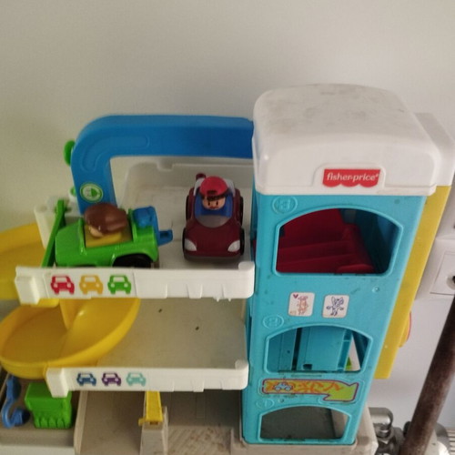 Fisher Price garage toy used with 2 figures