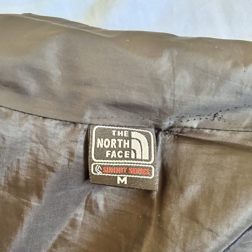 The North Face black jacket, logo faded