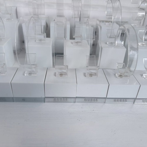 Guess 26 bases for bracelets or watches, like new, display stands set