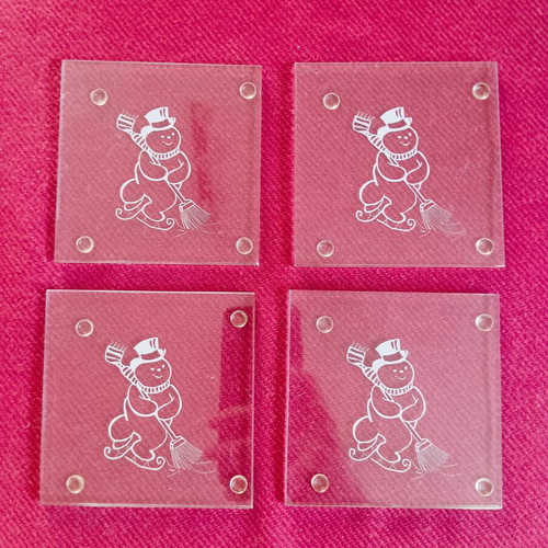 Set of 4 glass coasters with snowman, like new, Christmas