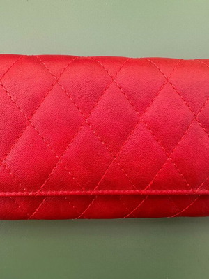 Red wallet like new with 12 card slots and zipper coin pocket