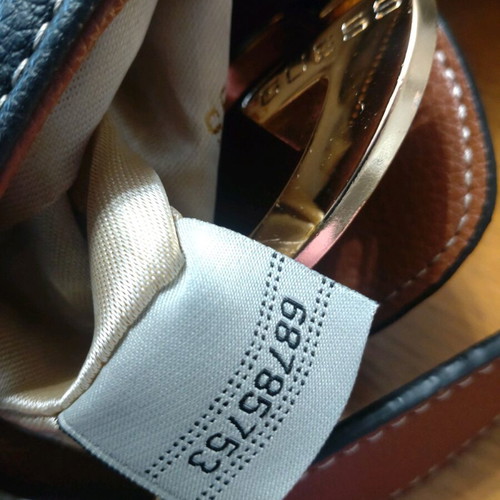 Guess shoulder bag like new, black with tan
