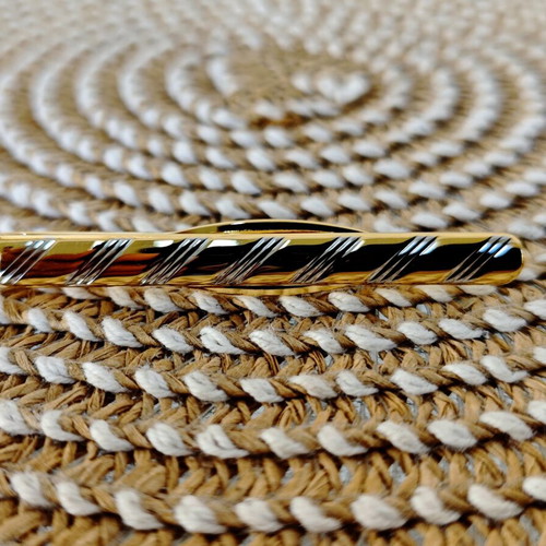 Vintage J.M. tie clip, two-tone silver and gold