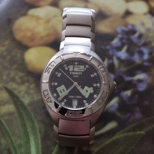 Tissot men's wristwatch like new, silver with sapphire crystal