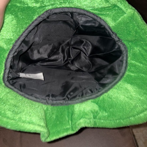 Large black and green hat