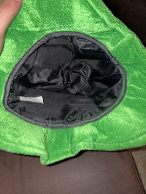Large black and green hat
