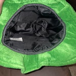 Large black and green hat