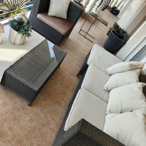 Outdoor corner set with table used, aluminum and rattan