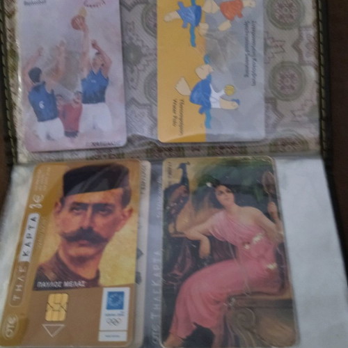Collectible old phone cards used with album