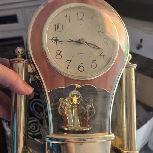 Quartz decorative table clock used with rotating Christmas scene