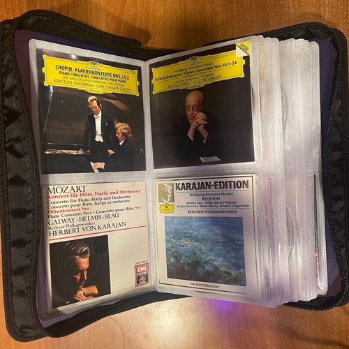 Collection of 64 CDs with carrying case, classical jazz entechno