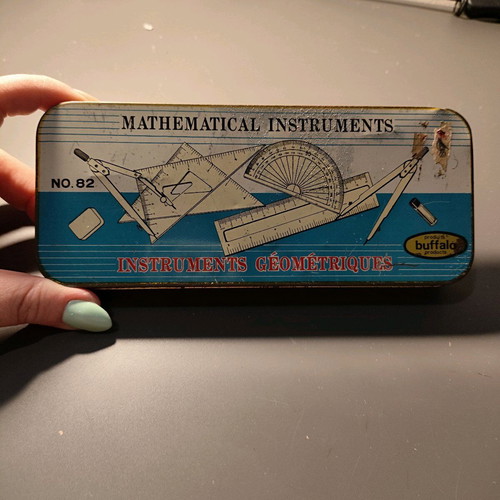 Vintage set of geometric instruments used