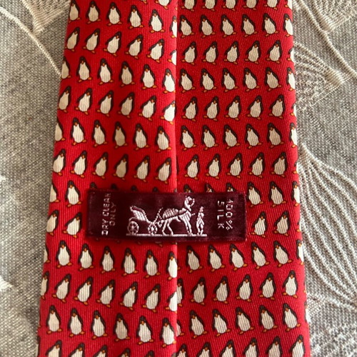 Hermes handmade silk tie with penguin pattern like new, red