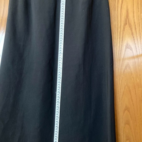 Asymmetric black skirt like new with pleat and front slit