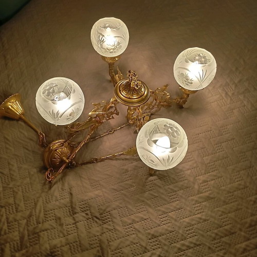 Solid brass chandelier used with crystals and putto figurine