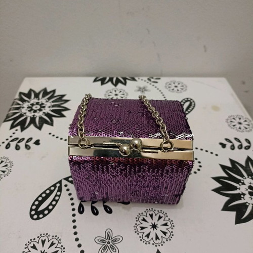 Clutch bag polygonal like new with purple sequins
