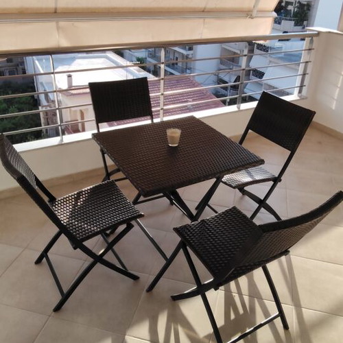 Garden table 70x70 with 4 chairs like new plastic