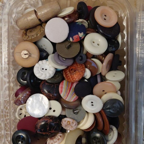Collection of small and large buttons, beads and iron buttons
