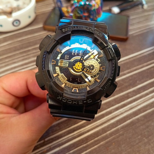 Casio G-Shock GA-110GB black and gold watch like new