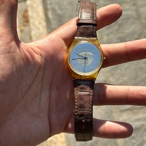 Vintage Swatch Swiss watch 34mm, transparent yellow case, brown strap