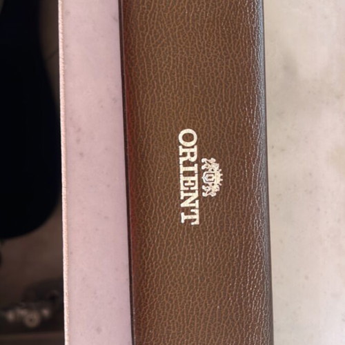 Orient watch case like new with strap and side mark